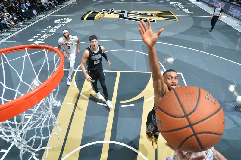 SAN ANTONIO, TX - OCTOBER 22:  Keldon Johnson #0 of the San Antonio Spurs attempts a block during the NBA Cup game against the Los Angeles Lakers on October 22, 2024 at the Frost Bank Center in San Antonio, Texas. NOTE TO USER: User expressly acknowledges and agrees that, by downloading and or using this photograph, user is consenting to the terms and conditions of the Getty Images License Agreement. Mandatory Copyright Notice: Copyright 2024 NBAE (Photos by Michael Gonzales/NBAE via Getty Images)