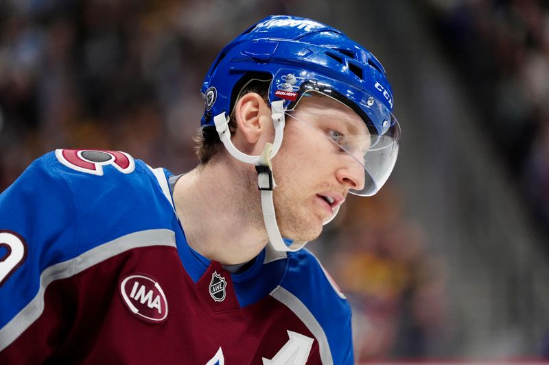 Mar 4, 2025; Denver, Colorado, USA; Colorado Avalanche center Nathan MacKinnon (29) during the third period against the Pittsburgh Penguins at Ball Arena. Mandatory Credit: Ron Chenoy-Imagn Images