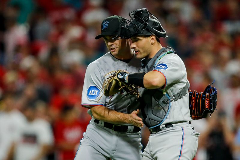 Marlins Aim to Net Victory Against Reds in Cincinnati Confrontation