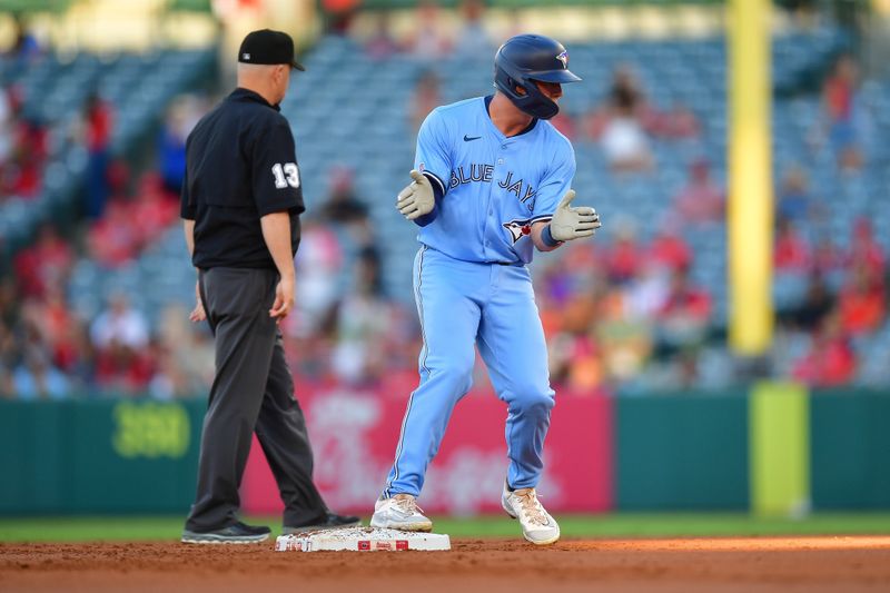 Aug 12, 2024; Anaheim, California, USA; Toronto Blue Jays second baseman Will Wagner (7) reaches second on a doulbe against the Los Angeles Angels during the second inning in his major league debut at Angel Stadium. Mandatory Credit: Gary A. Vasquez-USA TODAY Sports