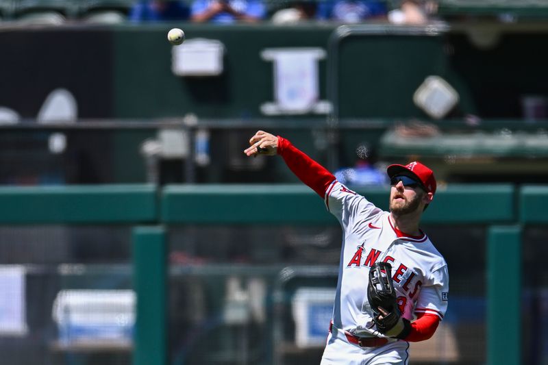 Aug 24, 2025; Anaheim, California, USA; Los Angeles Angels outfielder Taylor Ward (3) fields a ball against the Chicago Cubs during the fifth inning at Angel Stadium. Mandatory Credit: Jonathan Hui-Imagn Images Aug 24, 2025; Anaheim, California, USA; Los Angeles Angels outfielder Taylor Ward (3) fields a ball against the Chicago Cubs during the fifth inning at Angel Stadium. Mandatory Credit: Jonathan Hui-Imagn Images