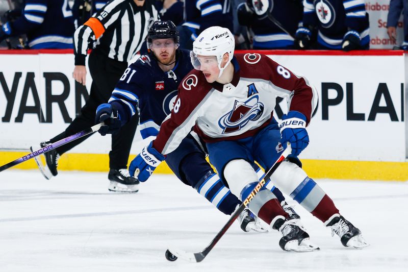 Apr 23, 2024; Winnipeg, Manitoba, CAN; Colorado Avalanche defenseman Cale Makar (8) skates away from Winnipeg Jets forward Kyle Connor (81) during the second period in game two of the first round of the 2024 Stanley Cup Playoffs at Canada Life Centre. Mandatory Credit: Terrence Lee-USA TODAY Sports