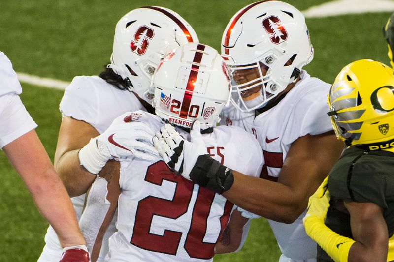 Nov 7, 2020; Eugene, Oregon, USA; Stanford Cardinal running back Austin Jones (20) celebrates with teammates after scoring a touchdown during the first half against the Oregon Ducks at Autzen Stadium. Mandatory Credit: Troy Wayrynen-USA TODAY Sports