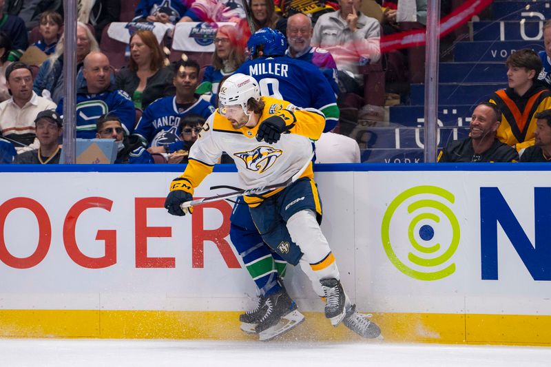 Apr 21, 2024; Vancouver, British Columbia, CAN; Nashville Predators forward Tommy Novak (82) checks Vancouver Canucks forward J.T. Miller (9) in the first period in game one of the first round of the 2024 Stanley Cup Playoffs at Rogers Arena. Mandatory Credit: Bob Frid-USA TODAY Sports