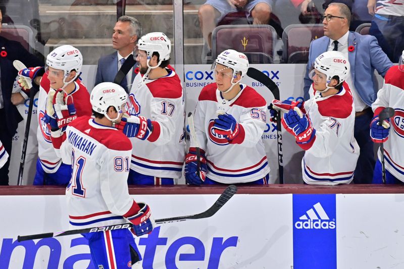 Nov 2, 2023; Tempe, Arizona, USA;  Montreal Canadiens center Sean Monahan (91) celebrates with teammates after scoring a goal in the first period against the Arizona Coyotes at Mullett Arena. Mandatory Credit: Matt Kartozian-USA TODAY Sports