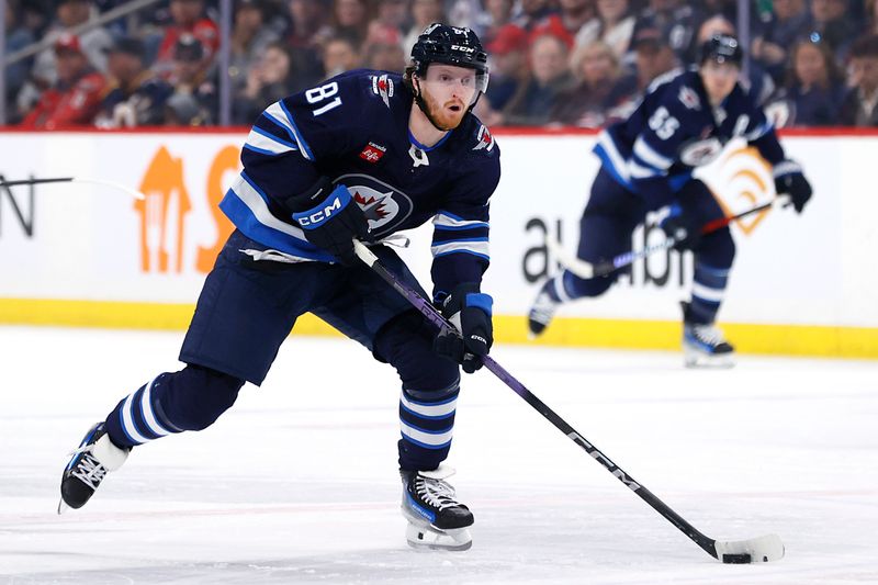 Mar 11, 2024; Winnipeg, Manitoba, CAN; Winnipeg Jets left wing Kyle Connor (81) skates through the neutral zone in the second period against the Washington Capitals at Canada Life Centre. Mandatory Credit: James Carey Lauder-USA TODAY Sports