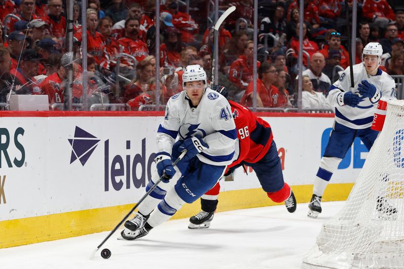 Apr 13, 2024; Washington, District of Columbia, USA; Tampa Bay Lightning right wing Mitchell Chaffee (41) skates with the puck as Washington Capitals right wing Nicolas Aube-Kubel (96) chases in the second period at Capital One Arena. Mandatory Credit: Geoff Burke-USA TODAY Sports