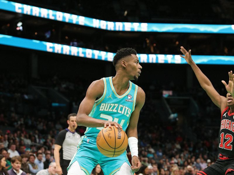 CHARLOTTE, NC - JANUARY 31: Brandon Miller #24 of the Charlotte Hornets dribbles the ball during the game against the Chicago Bulls on January 31, 2024 at Spectrum Center in Charlotte, North Carolina. NOTE TO USER: User expressly acknowledges and agrees that, by downloading and or using this photograph, User is consenting to the terms and conditions of the Getty Images License Agreement.  Mandatory Copyright Notice:  Copyright 2024 NBAE (Photo by Brock Williams-Smith/NBAE via Getty Images)