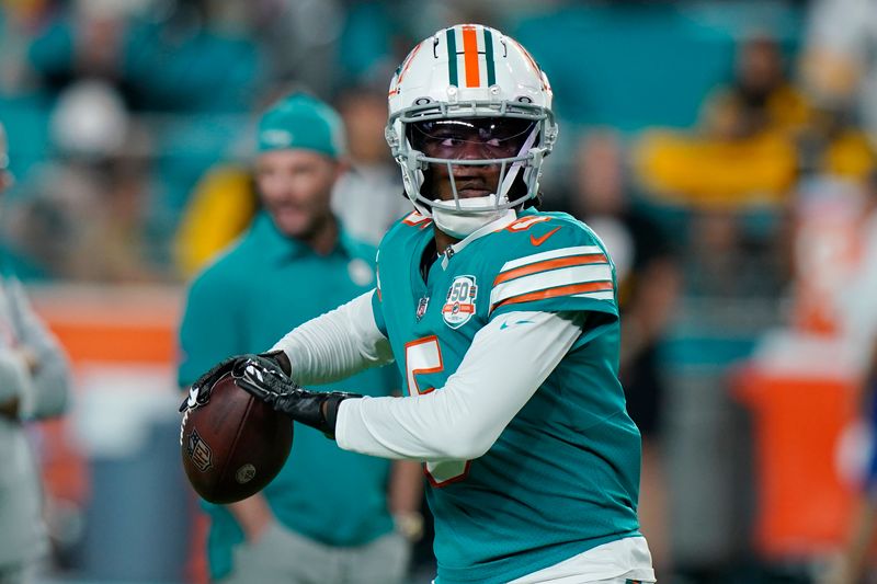 Miami Dolphins quarterback Teddy Bridgewater (5) warms up before an NFL football game against the Pittsburgh Steelers, Sunday, Oct. 23, 2022, in Miami Gardens, Fla. (AP Photo/Wilfredo Lee )