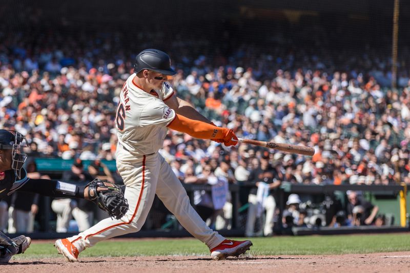 Apr 21, 2024; San Francisco, California, USA;  San Francisco Giants third baseman Matt Chapman (26) hits a double against the Arizona Diamondbacks during the ninth inning at Oracle Park. Mandatory Credit: John Hefti-USA TODAY Sports