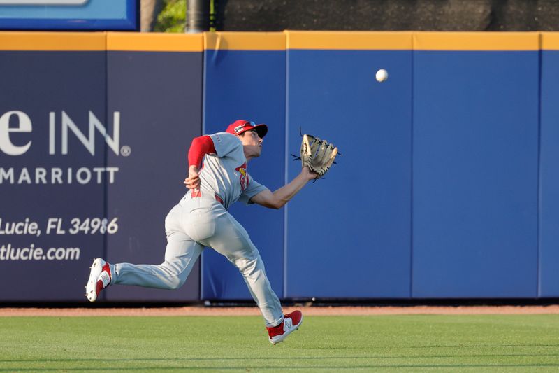 Mar 14, 2025; Port St. Lucie, Florida, USA;  St. Louis Cardinals outfielder Matt Koperniak (29) chases down a fly ball during the second  inning against the New York Mets at Clover Park. Mandatory Credit: Reinhold Matay-Imagn Images