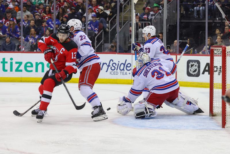 Apr 5, 2025; Newark, New Jersey, USA; New York Rangers goaltender Igor Shesterkin (31) makes a save against the New Jersey Devils during the second period at Prudential Center. Mandatory Credit: Ed Mulholland-Imagn Images