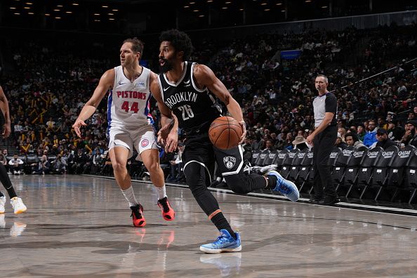 BROOKLYN, NY - DECEMBER 23: Spencer Dinwiddie #26 of the Brooklyn Nets drives to the basket during the game against the Detroit Pistons on December 23, 2023 at Barclays Center in Brooklyn, New York. NOTE TO USER: User expressly acknowledges and agrees that, by downloading and or using this Photograph, user is consenting to the terms and conditions of the Getty Images License Agreement. Mandatory Copyright Notice: Copyright 2023 NBAE (Photo by Jesse D. Garrabrant/NBAE via Getty Images)