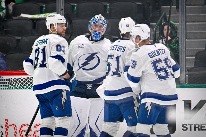 Jan 18, 2026; Dallas, Texas, USA; Tampa Bay Lightning defenseman Erik Cernak (81) and goaltender Andrei Vasilevskiy (88) and defenseman Charle-Edouard D'Astous (51) and center Jake Guentzel (59) celebrate the win over the Dallas Stars at the American Airlines Center. Mandatory Credit: Jerome Miron-Imagn Images