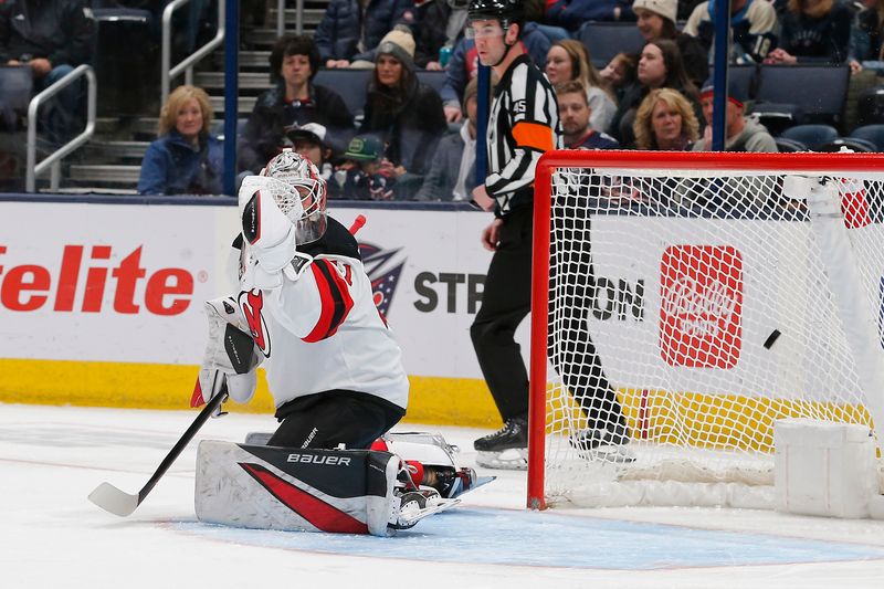 Jan 19, 2024; Columbus, Ohio, USA; Columbus Blue Jackets Forward Cole Sillinger (4) scores a goal against New Jersey Devils goalie Vitek Vanecek (41) for a goal during the first period at Nationwide Arena. Mandatory Credit: Russell LaBounty-USA TODAY Sports