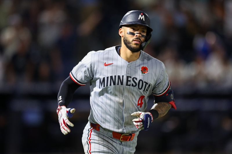 May 26, 2025; Tampa, Florida, USA; Minnesota Twins shortstop Carlos Correa (4) runs the bases after hitting a two run home run against the Tampa Bay Rays in the seventh inning at George M. Steinbrenner Field. Mandatory Credit: Nathan Ray Seebeck-Imagn Images