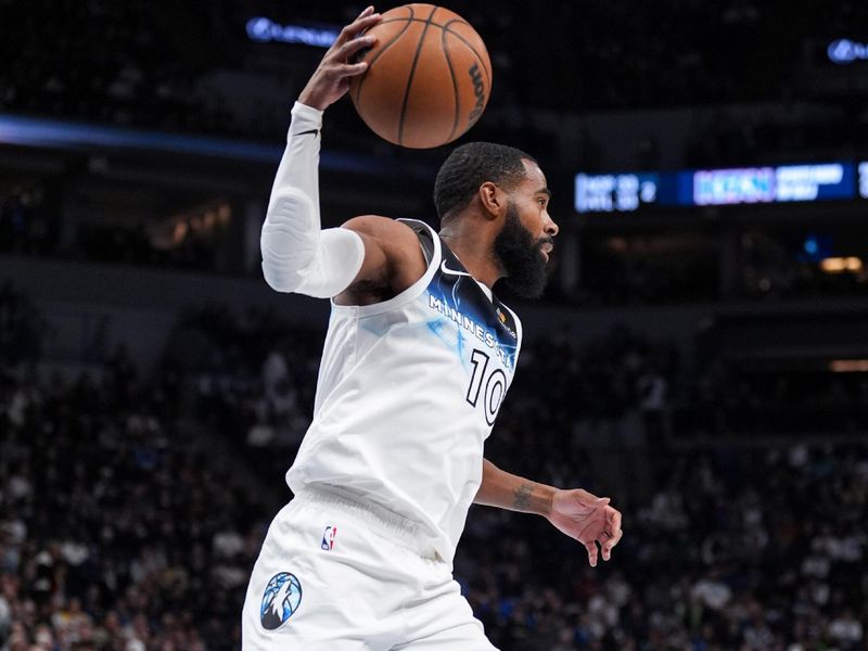 MINNEAPOLIS, MN - DECEMBER 2: Mike Conley #10 of the Minnesota Timberwolves rebounds the ball during the game against the Los Angeles Lakers on December 2, 2024 at Target Center in Minneapolis, Minnesota. NOTE TO USER: User expressly acknowledges and agrees that, by downloading and or using this Photograph, user is consenting to the terms and conditions of the Getty Images License Agreement. Mandatory Copyright Notice: Copyright 2024 NBAE (Photo by Jordan Johnson/NBAE via Getty Images)