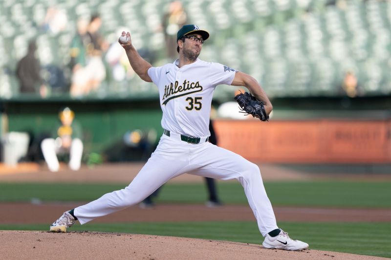 Apr 29, 2024; Oakland, California, USA; Oakland Athletics pitcher Joe Boyle (35) pitches during the first inning against the Pittsburgh Pirates at Oakland-Alameda County Coliseum. Mandatory Credit: Stan Szeto-USA TODAY Sports