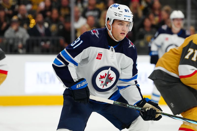 Nov 2, 2023; Las Vegas, Nevada, USA; Winnipeg Jets center Cole Perfetti (91) skates against the Vegas Golden Knights during the second period at T-Mobile Arena. Mandatory Credit: Stephen R. Sylvanie-USA TODAY Sports