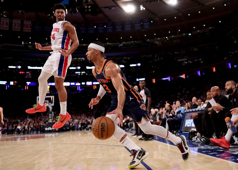 NEW YORK, NEW YORK - FEBRUARY 26: Josh Hart #3 of the New York Knicks heads for the net as Quentin Grimes #24 of the Detroit Pistons defends during the fourth quarter at Madison Square Garden on February 26, 2024 in New York City. The New York Knicks defeated the Detroit Pistons 113-111. NOTE TO USER: User expressly acknowledges and agrees that, by downloading and or using this photograph, User is consenting to the terms and conditions of the Getty Images License Agreement. (Photo by Elsa/Getty Images)