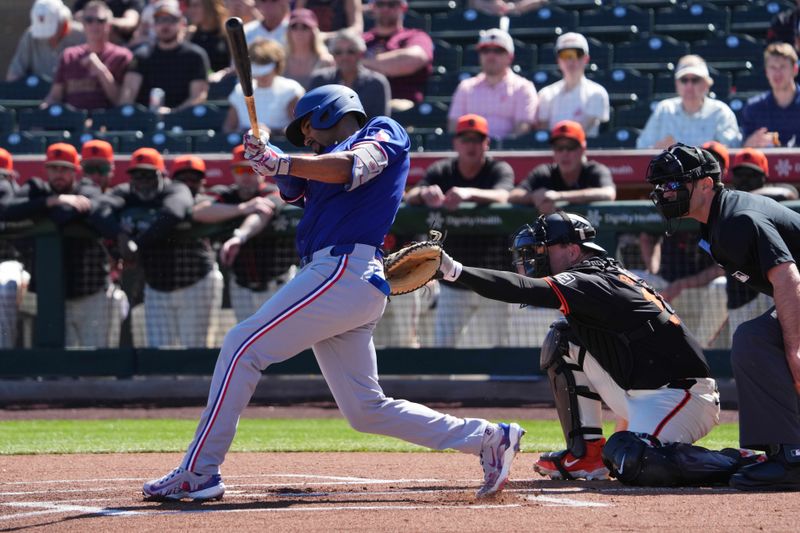 Mar 1, 2024; Scottsdale, Arizona, USA; Texas Rangers second baseman Marcus Semien (2) bats against the San Francisco Giants during the first inning at Scottsdale Stadium. Mandatory Credit: Joe Camporeale-USA TODAY Sports