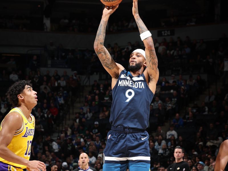 MINNEAPOLIS, MN -  DECEMBER 13:  Nickeil Alexander-Walker #9 of the Minnesota Timberwolves shoots a three point basket during the game against the Los Angeles Lakers on December 13, 2024 at Target Center in Minneapolis, Minnesota. NOTE TO USER: User expressly acknowledges and agrees that, by downloading and or using this Photograph, user is consenting to the terms and conditions of the Getty Images License Agreement. Mandatory Copyright Notice: Copyright 2024 NBAE (Photo by David Sherman/NBAE via Getty Images)