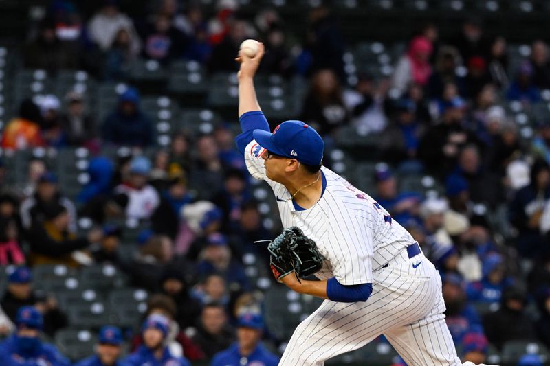 Apr 2, 2024; Chicago, Illinois, USA; Chicago Cubs starting pitcher Javier Assad (72) delivers against the Colorado Rockies during the first inning at Wrigley Field. Mandatory Credit: Matt Marton-USA TODAY Sports