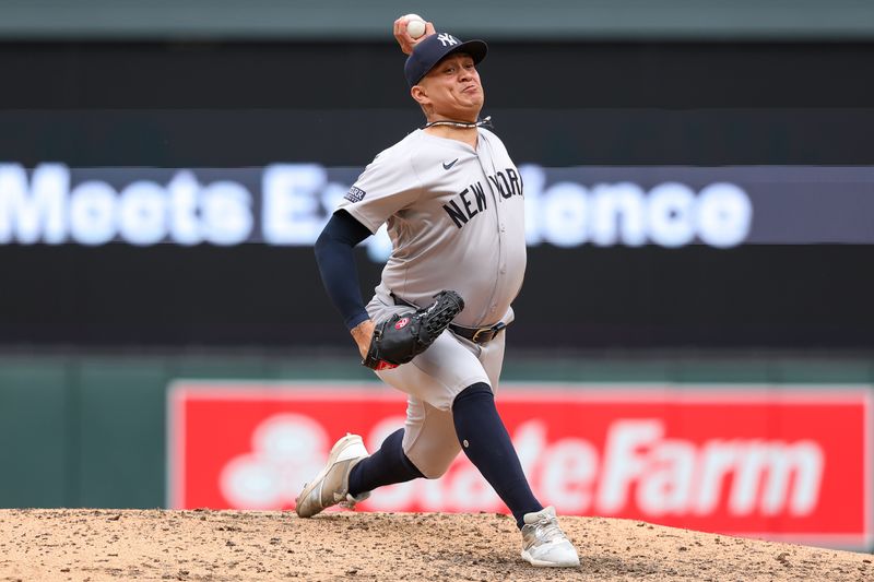 May 16, 2024; Minneapolis, Minnesota, USA; New York Yankees relief pitcher Victor Gonzalez (47) delivers a pitch against the Minnesota Twins during the ninth inning at Target Field. Mandatory Credit: Matt Krohn-USA TODAY Sports