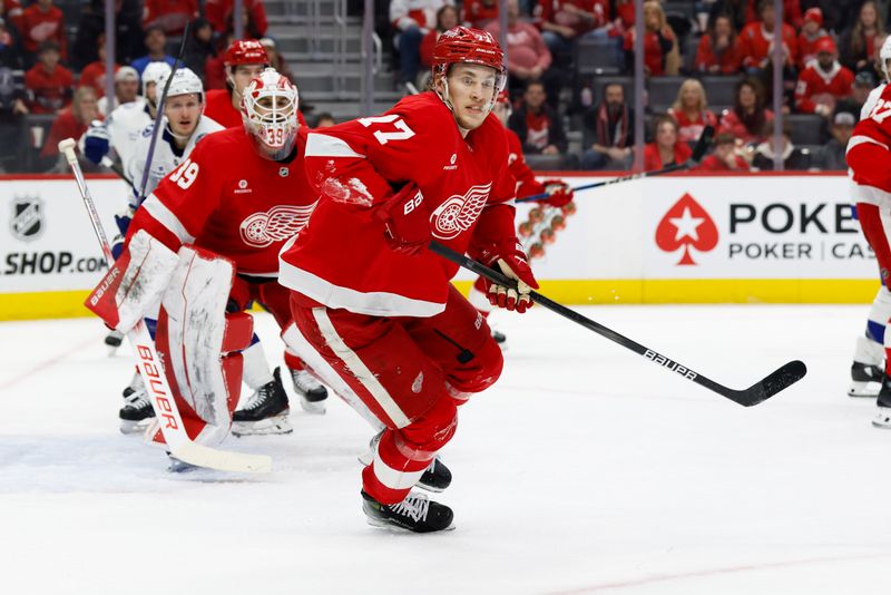 Jan 25, 2025; Detroit, Michigan, USA;  Detroit Red Wings defenseman Simon Edvinsson (77) skates in the third period against the Tampa Bay Lightning at Little Caesars Arena. Mandatory Credit: Rick Osentoski-Imagn Images