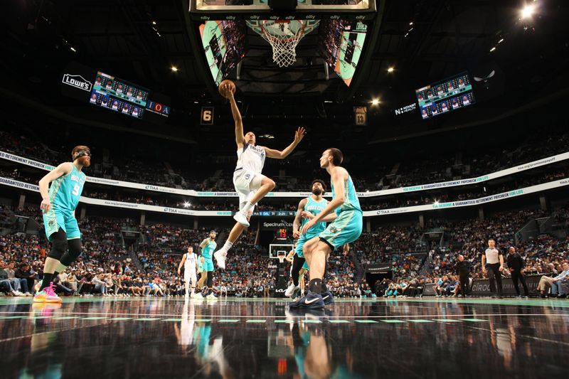 CHARLOTTE, NC - APRIL 9: Dante Exum #0 of the Dallas Mavericks drives to the basket during the game against the Charlotte Hornets on April 9, 2024 at Spectrum Center in Charlotte, North Carolina. NOTE TO USER: User expressly acknowledges and agrees that, by downloading and or using this photograph, User is consenting to the terms and conditions of the Getty Images License Agreement. Mandatory Copyright Notice: Copyright 2024 NBAE (Photo by Kent Smith/NBAE via Getty Images)