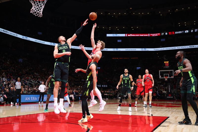 TORONTO, CANADA - JANUARY 15: Gradey Dick #1 of the Toronto Raptors shoots the ball during the game against the Boston Celtics on January 15, 2025 at the Scotiabank Arena in Toronto, Ontario, Canada.  NOTE TO USER: User expressly acknowledges and agrees that, by downloading and or using this Photograph, user is consenting to the terms and conditions of the Getty Images License Agreement.  Mandatory Copyright Notice: Copyright 2025 NBAE (Photo by Vaughn Ridley/NBAE via Getty Images)