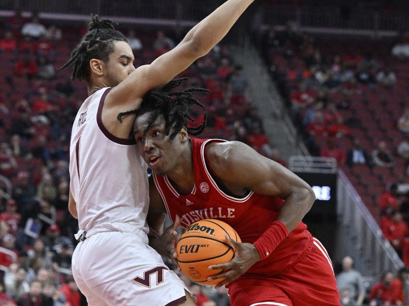 Feb 28, 2023; Louisville, Kentucky, USA; Louisville Cardinals guard Mike James (1) drives to the basket against Virginia Tech Hokies guard Rodney Rice (1) during the second half at KFC Yum! Center. Virginia Tech defeated Louisville 71-54. Mandatory Credit: Jamie Rhodes-USA TODAY Sports