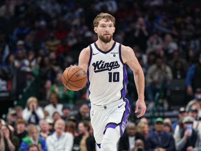 DALLAS, TX - JANUARY 27: Domantas Sabonis #10 of the Sacramento Kings handles the ball during the game  on January 27, 2024 at the American Airlines Center in Dallas, Texas. NOTE TO USER: User expressly acknowledges and agrees that, by downloading and or using this photograph, User is consenting to the terms and conditions of the Getty Images License Agreement. Mandatory Copyright Notice: Copyright 2024 NBAE (Photo by Glenn James/NBAE via Getty Images)