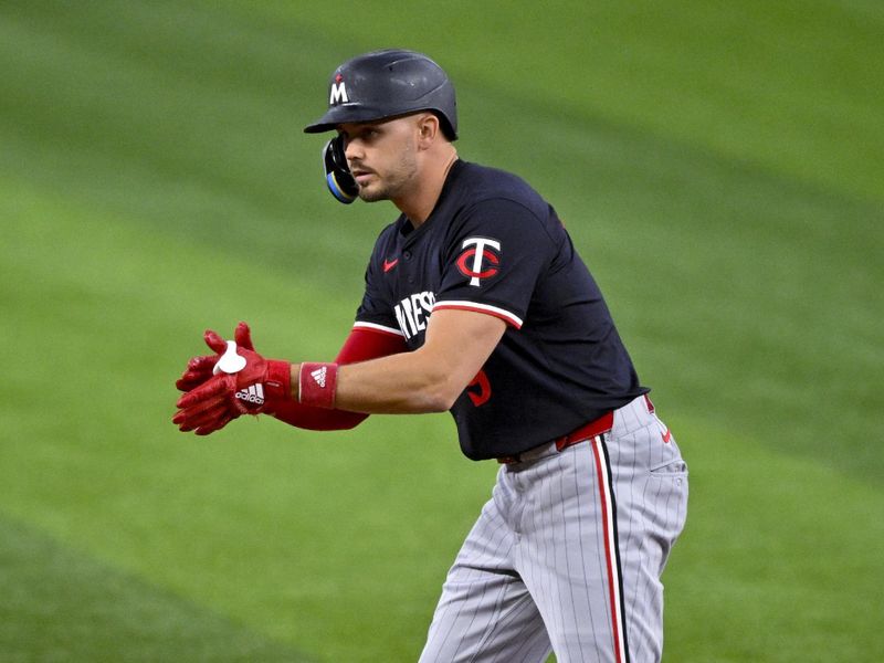 Aug 18, 2024; Arlington, Texas, USA; Minnesota Twins designated hitter Trevor Larnach (9) hits a double and drives in a run against the Texas Rangers during the first inning at Globe Life Field. Mandatory Credit: Jerome Miron-USA TODAY Sports
