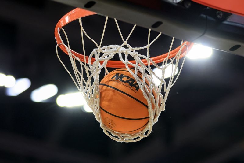 Feb 4, 2023; Cincinnati, Ohio, USA;  The NCAA logo is seen on a Wilson game ball during a free throw attempt in the game between the UCF Knights and the Cincinnati Bearcats in the second half at Fifth Third Arena. Mandatory Credit: Aaron Doster-USA TODAY Sports