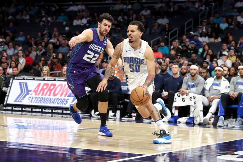 CHARLOTTE, NC - MARCH 5: Cole Anthony #50 of the Orlando Magic handles the ball during the game against the Charlotte Hornets on March 5, 2024 at Spectrum Center in Charlotte, North Carolina. NOTE TO USER: User expressly acknowledges and agrees that, by downloading and or using this photograph, User is consenting to the terms and conditions of the Getty Images License Agreement.  Mandatory Copyright Notice:  Copyright 2024 NBAE (Photo by Brock Williams-Smith/NBAE via Getty Images)