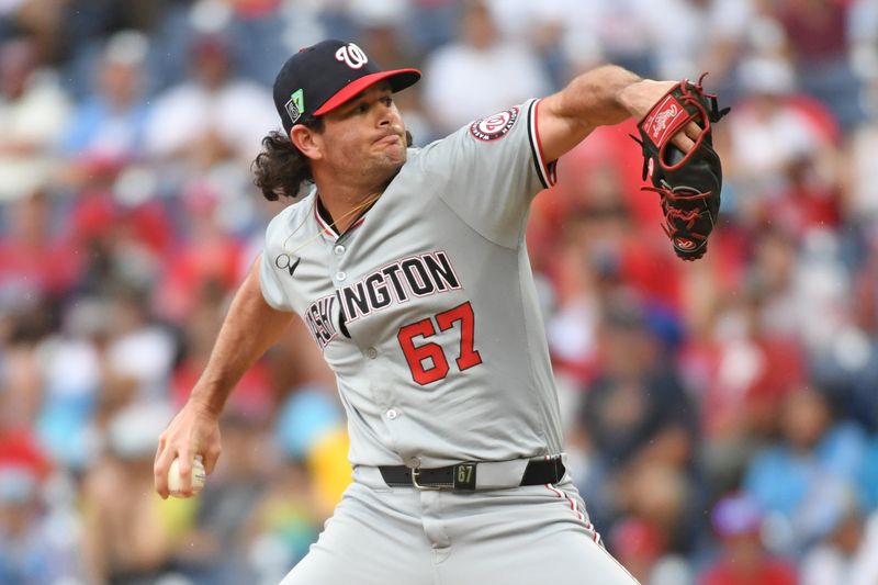 Aug 18, 2024; Philadelphia, Pennsylvania, USA; Washington Nationals pitcher Kyle Finnegan (67) throws a pitch during the ninth inning against the Philadelphia Phillies at Citizens Bank Park. Mandatory Credit: Eric Hartline-USA TODAY Sports