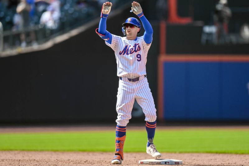 May 2, 2024; New York City, New York, USA; New York Mets outfielder Brandon Nimmo (9) reacts after hitting a RBI double against the Chicago Cubs during the sixth inning at Citi Field. Mandatory Credit: John Jones-USA TODAY Sports