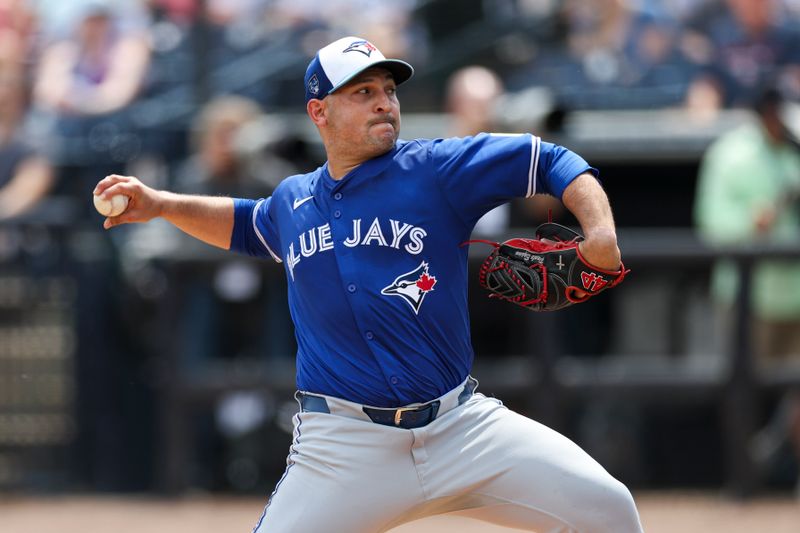 Mar 16, 2024; Tampa, Florida, USA;  Toronto Blue Jays pitcher Paolo Espino (52) throws a pitch against the New York Yankees in the first inning at George M. Steinbrenner Field. Mandatory Credit: Nathan Ray Seebeck-USA TODAY Sports