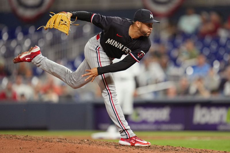 Apr 4, 2023; Miami, Florida, USA;  Minnesota Twins relief pitcher Jovani Moran (71) pitches in the eighth inning against the Miami Marlins at loanDepot Park. Mandatory Credit: Jim Rassol-USA TODAY Sports