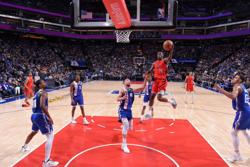 SACRAMENTO, CA - APRIL 14:  Taze Moore #76 of the Portland Trailblazers goes to the basket during the game on April 14, 2024 at Golden 1 Center in Sacramento, California. NOTE TO USER: User expressly acknowledges and agrees that, by downloading and or using this Photograph, user is consenting to the terms and conditions of the Getty Images License Agreement. Mandatory Copyright Notice: Copyright 2024 NBAE (Photo by Rocky Widner/NBAE via Getty Images)