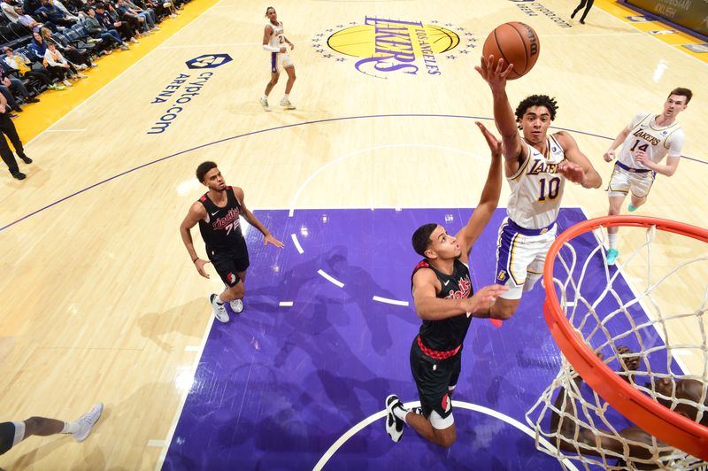 LOS ANGELES, CA - JANUARY 21:  Max Christie #10 of the Los Angeles Lakers goes to the basket during the game on January 21, 2024 at Crypto.Com Arena in Los Angeles, California. NOTE TO USER: User expressly acknowledges and agrees that, by downloading and/or using this Photograph, user is consenting to the terms and conditions of the Getty Images License Agreement. Mandatory Copyright Notice: Copyright 2024 NBAE (Photo by Juan Ocampo/NBAE via Getty Images)