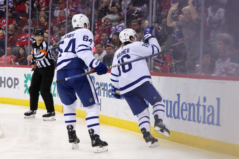 Mar 7, 2023; Newark, New Jersey, USA; Toronto Maple Leafs right wing Mitchell Marner (16) celebrates his goal against the New Jersey Devils during the third period at Prudential Center. Mandatory Credit: Ed Mulholland-USA TODAY Sports