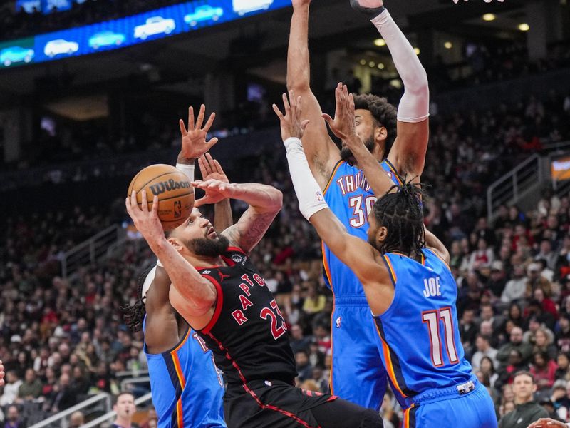 TORONTO, ON - MARCH 16: Fred VanVleet #23 of the Toronto Raptors is guarded by Isaiah Joe #11 and Olivier Sarr #30 of the Oklahoma City Thunder during the second half of their basketball game at the Scotiabank Arena on March 16, 2023 in Toronto, Ontario, Canada. NOTE TO USER: User expressly acknowledges and agrees that, by downloading and/or using this Photograph, user is consenting to the terms and conditions of the Getty Images License Agreement. (Photo by Mark Blinch/Getty Images)