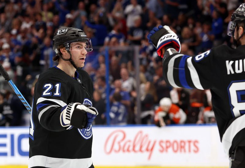 Mar 9, 2024; Tampa, Florida, USA; Tampa Bay Lightning center Brayden Point (21) celebrates after scoring a goal against the Philadelphia Flyers during the first period at Amalie Arena. Mandatory Credit: Kim Klement Neitzel-USA TODAY Sports