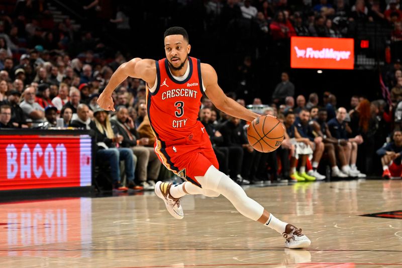 PORTLAND, OREGON - APRIL 09: CJ McCollum #3 of the New Orleans Pelicans dribbles during the first quarter of the game against the Portland Trail Blazers at the Moda Center on April 09, 2024 in Portland, Oregon. The New Orleans Pelicans won 110-100. NOTE TO USER: User expressly acknowledges and agrees that, by downloading and or using this photograph, User is consenting to the terms and conditions of the Getty Images License Agreement. (Photo by Alika Jenner/Getty Images)