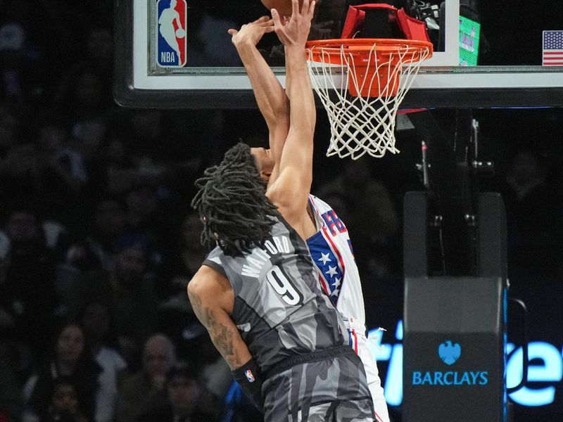 BROOKLYN, NY - FEBRUARY 12: (Block Sequence 2 of 3): Trendon Watford #9 of the Brooklyn Nets blocks the ball during the game against the Philadelphia 76ers on February 12, 2025 at Barclays Center in Brooklyn, New York. NOTE TO USER: User expressly acknowledges and agrees that, by downloading and or using this Photograph, user is consenting to the terms and conditions of the Getty Images License Agreement. Mandatory Copyright Notice: Copyright 2025 NBAE (Photo by Jesse D. Garrabrant/NBAE via Getty Images)