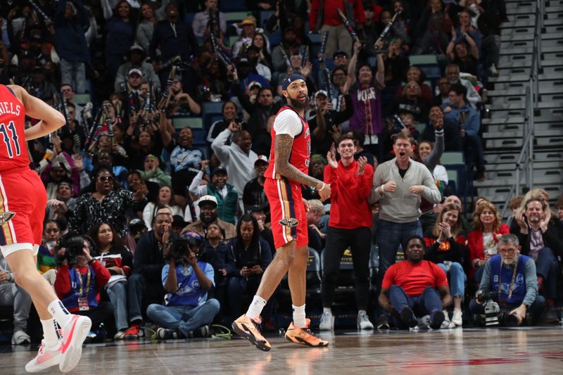 NEW ORLEANS, LA - FEBRUARY 5: Brandon Ingram #14 of the New Orleans Pelicans celebrates a three point basket during the game against the Toronto Raptors on February 5, 2024 at the Smoothie King Center in New Orleans, Louisiana. NOTE TO USER: User expressly acknowledges and agrees that, by downloading and or using this Photograph, user is consenting to the terms and conditions of the Getty Images License Agreement. Mandatory Copyright Notice: Copyright 2024 NBAE (Photo by Layne Murdoch Jr./NBAE via Getty Images)