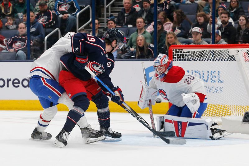 Nov 27, 2024; Columbus, Ohio, USA; Columbus Blue Jackets center Adam Fantilli (19) tips the puck wide against the Montreal Canadiens during the first period at Nationwide Arena. Mandatory Credit: Russell LaBounty-Imagn Images