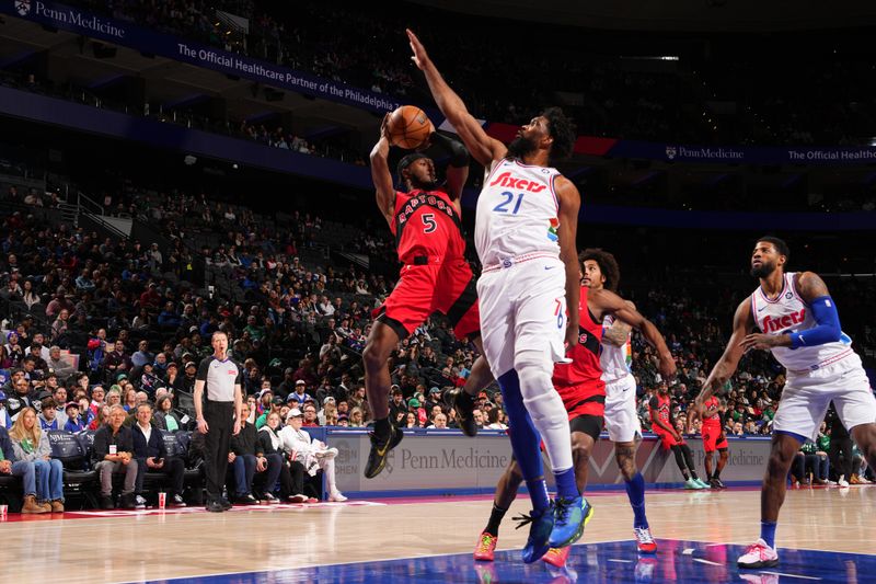 PHILADELPHIA, PA - FEBRUARY 11:  Immanuel Quickley #5 of the Toronto Raptors drives to the basket during the game against the Philadelphia 76ers  on February 11, 2025 at the Wells Fargo Center in Philadelphia, Pennsylvania NOTE TO USER: User expressly acknowledges and agrees that, by downloading and/or using this Photograph, user is consenting to the terms and conditions of the Getty Images License Agreement. Mandatory Copyright Notice: Copyright 2025 NBAE (Photo by Jesse D. Garrabrant/NBAE via Getty Images)